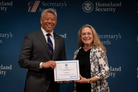 DHS Deputy Secretary John Tien with Innovation Award recipient, Erin Hayes.