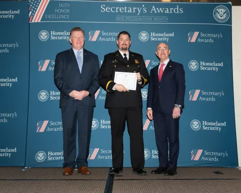 Left to right: U.S. Secret Service Director James Murray, Innovation Award recipient Richard J. Allwein, and DHS Secretary Alejandro Mayorkas.