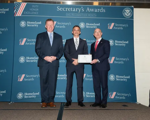 Left to right: U.S. Secret Service Director James Murray, Innovation Award recipient Steven Driscoll, and DHS Secretary Alejandro Mayorkas.
