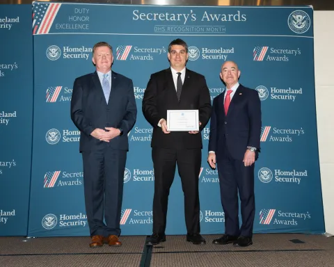 Left to right: U.S. Secret Service Director James Murray, Innovation Award recipient Jeffrey McGarry, and DHS Secretary Alejandro Mayorkas.