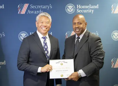 DHS Deputy Secretary John Tien and Secretary's Gold Medal recipient Arnold D. Jackson.