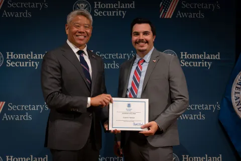 DHS Deputy Secretary John Tien with Leadership Excellence Award recipient, Elijah D. Packley.