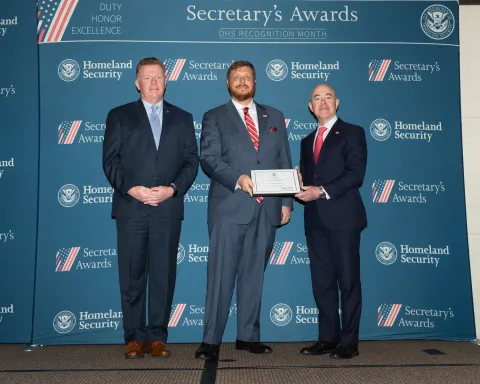 Left to right: U.S. Secret Service Director James Murray, Innovation Award recipient Dr. Aaron Cotkin, and DHS Secretary Alejandro Mayorkas.
