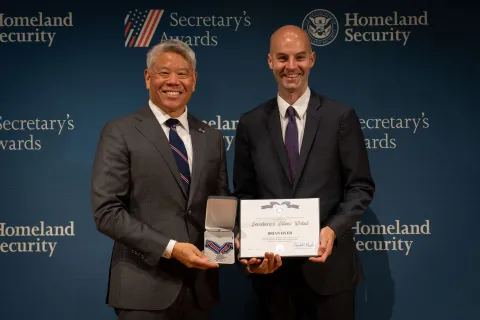 DHS Deputy Secretary John Tien with Secretary's Silver Medal recipient, Brian Hyer.
