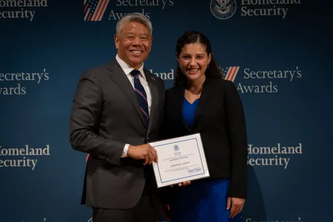 DHS Deputy Secretary John Tien with Leadership Excellence Award recipient, Samantha S. Dwork.