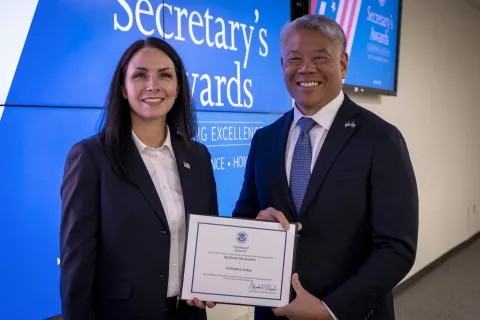 Innovation Award recipient, Christina Foley, with DHS Deputy Secretary John Tien.