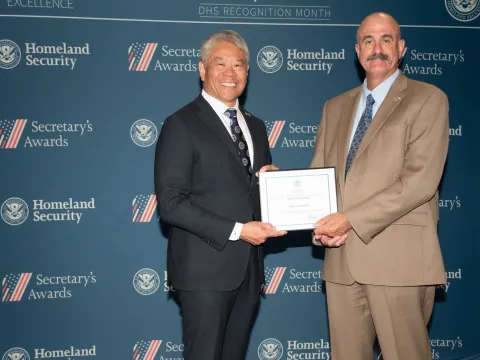 DHS Deputy Secretary John Tien with Innovation Award recipient, John A. Palmer.