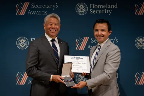 DHS Deputy Secretary John Tien with Secretary's Silver Medal recipient, Jesus Montes.