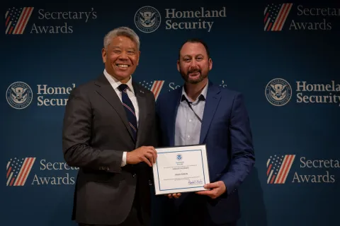 DHS Deputy Secretary John Tien with Innovation Award recipient, David Parkin. 
