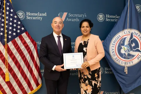 DHS Secretary Alejandro Mayorkas with Innovation Award recipient Manisha Miglani.