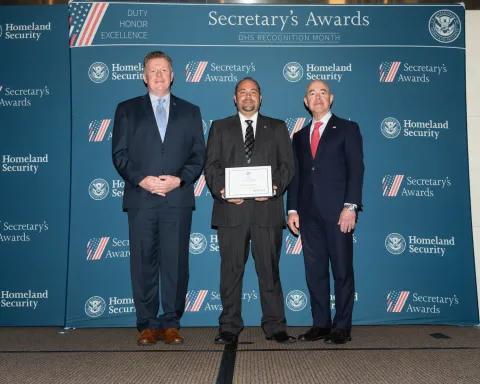 Left to right: U.S. Secret Service Director James Murray, Innovation Award recipient Michael Kapuscinski, and DHS Secretary Alejandro Mayorkas.