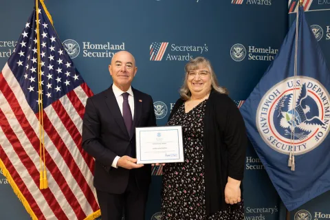 DHS Secretary Alejandro Mayorkas with Innovation Award recipient Elissa McGovern.