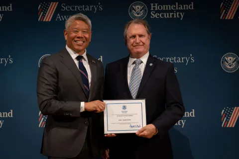 DHS Deputy Secretary John Tien with Team Excellence Award recipient, Joe T. Burchette. 