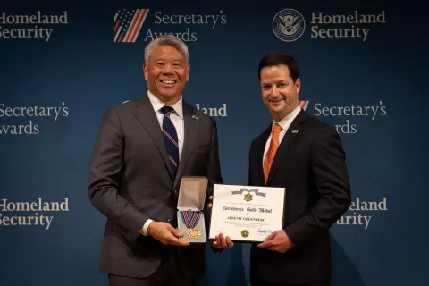 DHS Deputy Secretary John Tien and Secretary's Gold Medal recipient, Jeremy Greenberg.