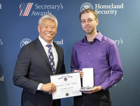 DHS Deputy Secretary John Tien with Secretary's Silver Medal recipient, Mathew Kister.