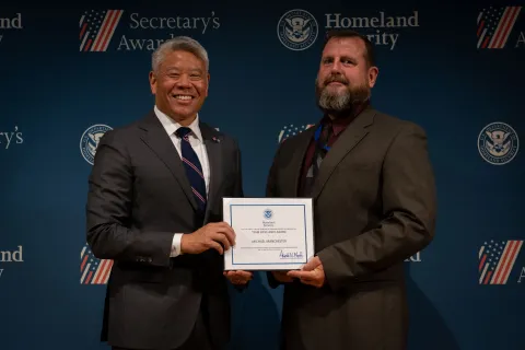 DHS Deputy Secretary John Tien with Team Excellence Award recipient, Michael Manchester.
