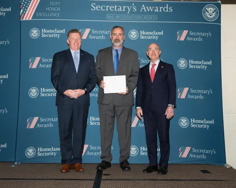 Left to right: U.S. Secret Service Director James Murray, Innovation Award recipient Andrew C. Murphy, and DHS Secretary Alejandro Mayorkas.