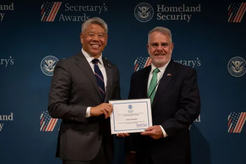 DHS Deputy Secretary John Tien with Team Excellence Award recipient, John Havranek.