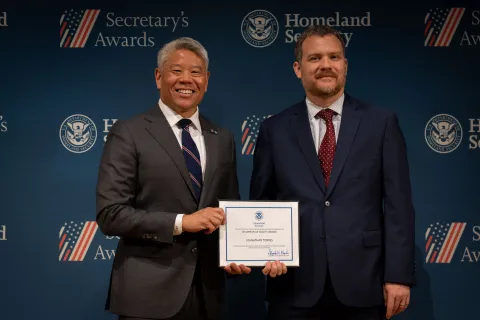 DHS Deputy Secretary John Tien with Champion of Equity Award recipient, Johnathan Torres.