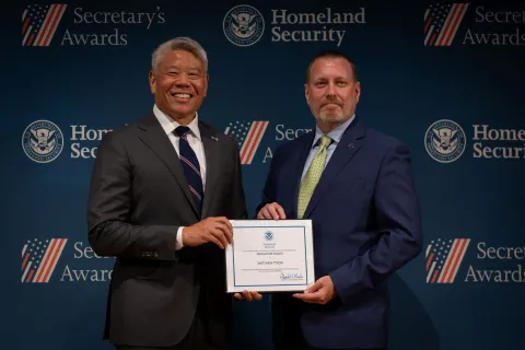 DHS Deputy Secretary John Tien with Innovation Award recipient, Matthew Tyson.