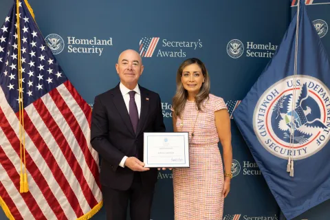 DHS Secretary Alejandro Mayorkas with Innovation Award recipient Bertha I. Anderson.