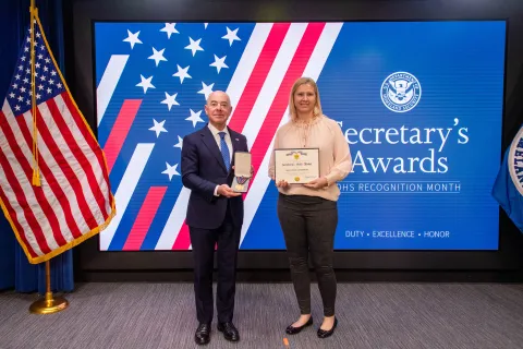 DHS Secretary Alejandro Mayorkas and Secretary's Gold Medal recipient Shannon Goodwin.