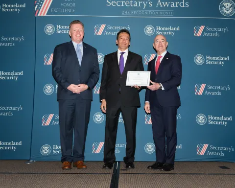 Left to right: U.S. Secret Service Director James Murray, Team Excellence Award recipient Cherng-Tsong Mark Lee, and DHS Secretary Alejandro Mayorkas.