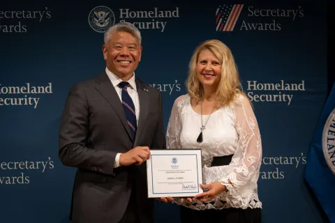 DHS Deputy Secretary John Tien with Leadership Excellence Award recipient, Diana K. Thorne.