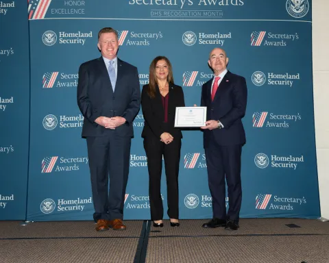 Left to right: U.S. Secret Service Director James Murray, Innovation Award recipient Dr. Lina Alathari and DHS Secretary Alejandro Mayorkas.
