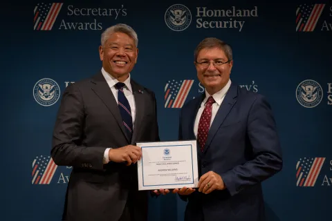 DHS Deputy Secretary John Tien with Team Excellence Award recipient, Andrew Williams.