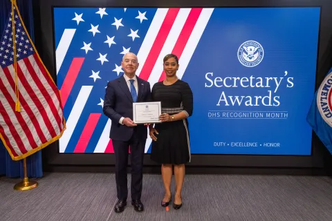 DHS Secretary Alejandro Mayorkas with Innovation Award recipient, Ronnyka V. Fitzpatrick.