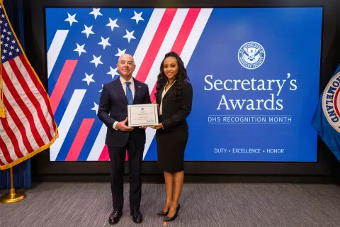 DHS Secretary Alejandro Mayorkas with Innovation Award recipient, Candice Walker.