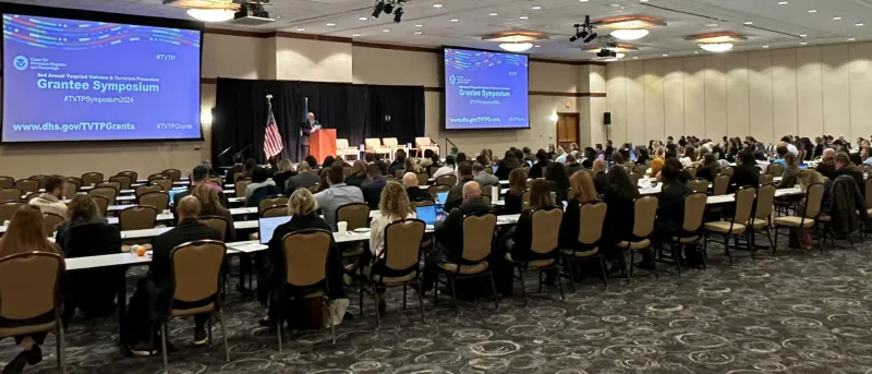 Caption: <p>Photo of the general session of the 2024 Targeted Violence and Terrorism Prevention Grantee Symposium, General Session, held February 1, 2024, in Leesburg, VA.</p>