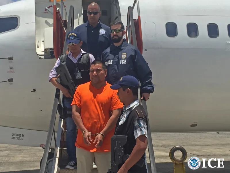 U.S. Immigration and Customs Enforcement officers remove a high-profile criminal human rights violator back to Guatemala after a longstanding effort to win the ex-commando’s removal.