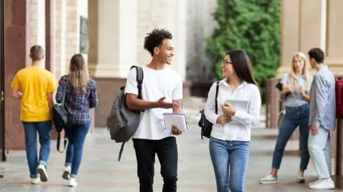 Students walking on campus together
