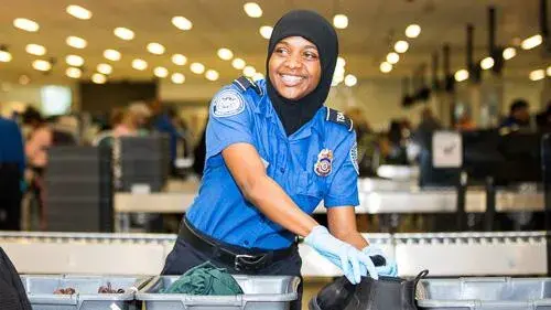 TSA agent smiling