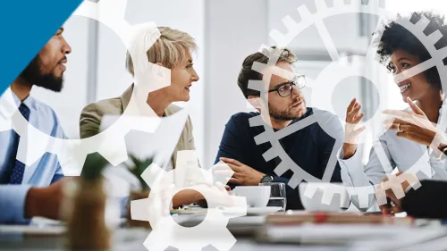 People Are Still Sort of Where It’s At - Graphic with gears showing over a photo of people at a meeting table