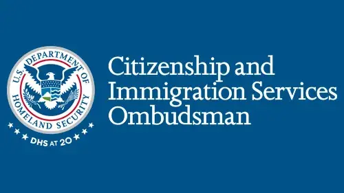 Horizontal CISOMB wordmark/lockup in white with "DHS at 20" below the DHS seal