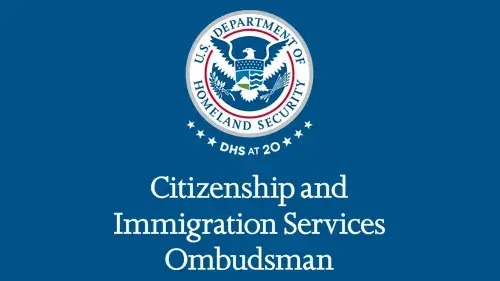 Vertical CISOMB wordmark/lockup in white with "DHS at 20" below the DHS seal