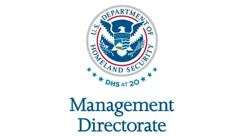 Vertical MGMT wordmark/lockup in blue with "DHS at 20" below the DHS seal