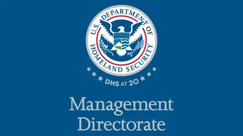 Vertical MGMT wordmark/lockup in gray with "DHS at 20" below the DHS seal