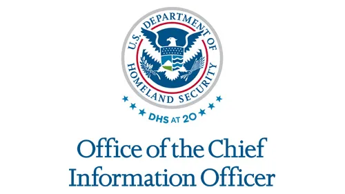 Vertical OCIO wordmark/lockup in blue with "DHS at 20" below the DHS seal