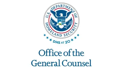 Vertical OGC wordmark/lockup in blue with "DHS at 20" below the DHS seal
