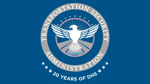 TSA logo with "20 Years of DHS" below the TSA logo in white