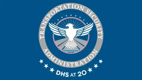 TSA logo with "DHS at 20" below the TSA logo in white