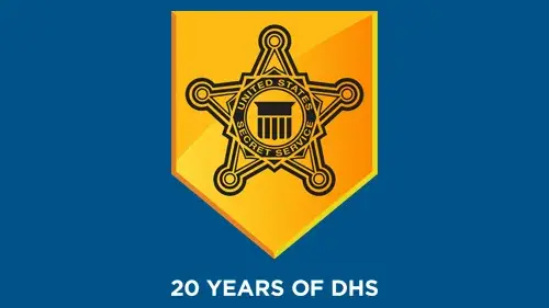 USSS logo with "20 Years of DHS" below the USSS logo in white