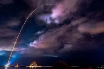 Rocket in flight from Cape Canaveral, FL.