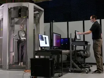 The Transportation Security Laboratory and Pacific Northwest National Laboratory developed a millimeter wave whole-body scanner that was introduced to DHS screening at airports in 2003 and was deployed nationwide by 2011. Photo: DOE.