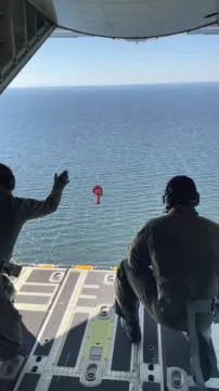 A MOTT buoy is deployed from the back of an HC-130J aircraft. 