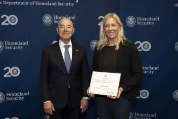 DHS Secretary Alejandro Mayorkas with Champion of Equity Award recipient, Julie Comeau. 